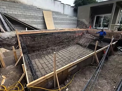 Pool excavation with the rebar reinforcement grid in place in La Verne, CA