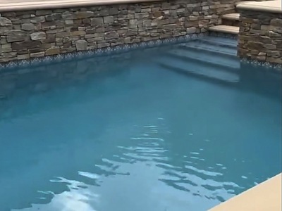 Pool steps and tile line entering the water in La Verne, CA