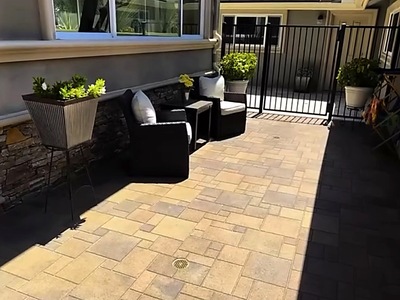 Paver patio seating nook next to the pool in La Verne, CA